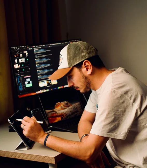 A person using a laptop to browse stock photo websites. Freelancing work in a cozy setting.